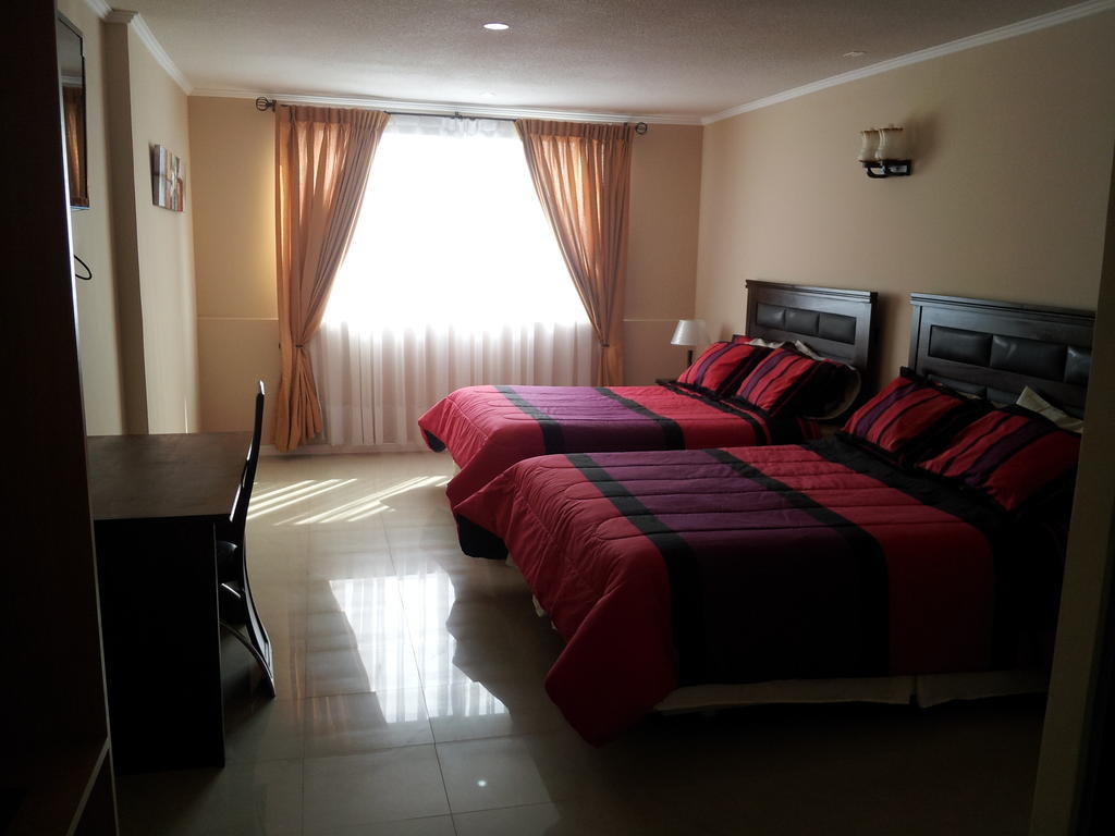 Hotel Astore Suites Antofagasta Szoba fotó